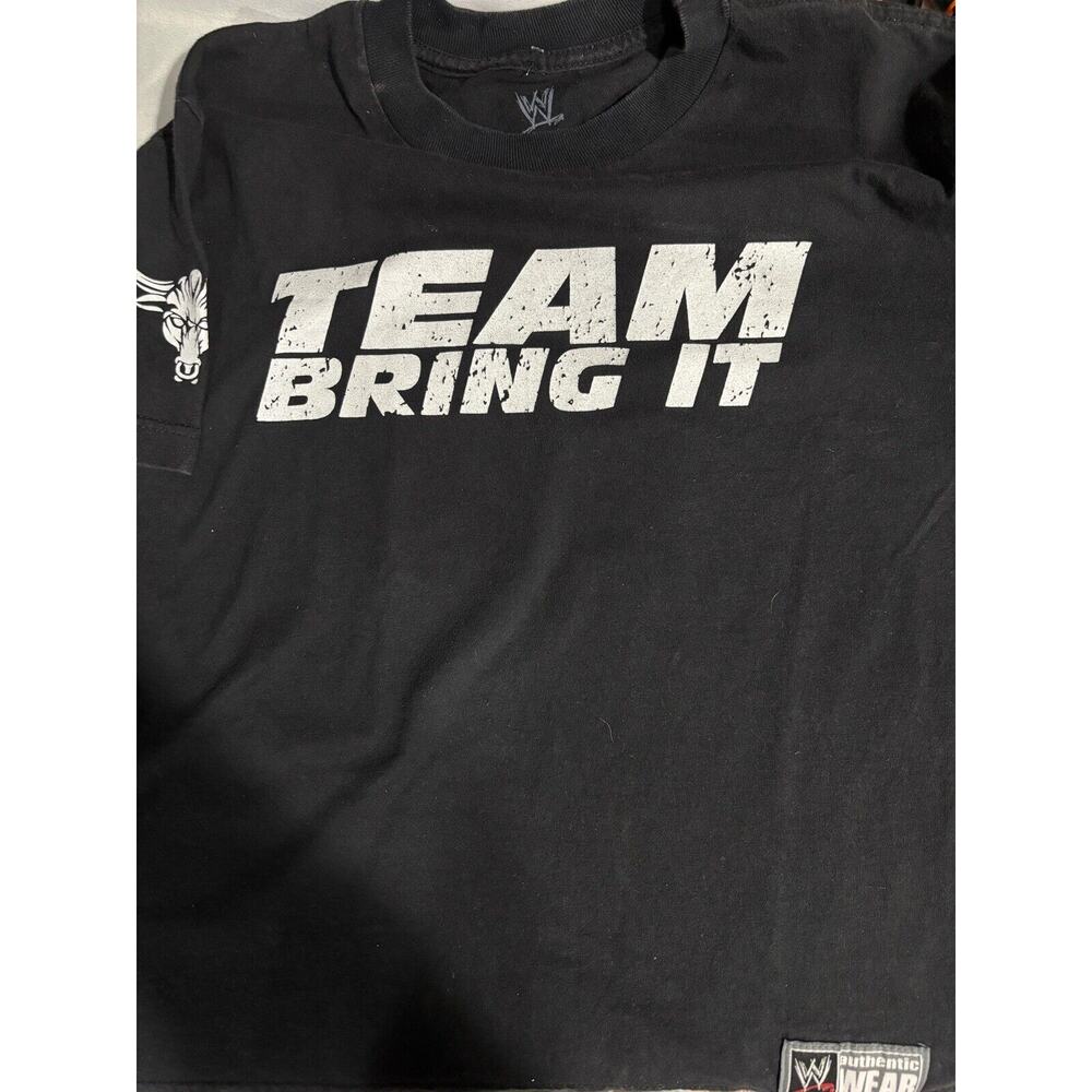 WWE Authentic Team Bring It Small Dog Bite The Rock YOUTH T-Shirt. Size Large